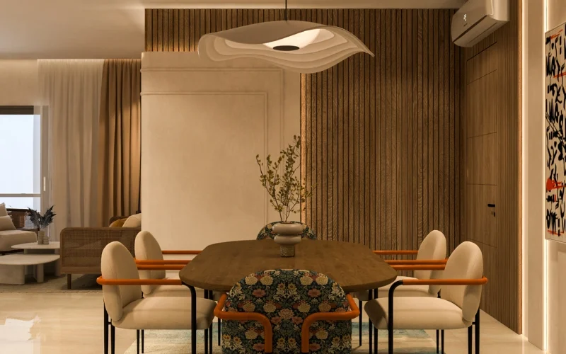 Home Decor Modern dining room interior design featuring an oval wooden table surrounded by stylish chairs with a large, artistic ceiling light adding a dramatic flair to the room.